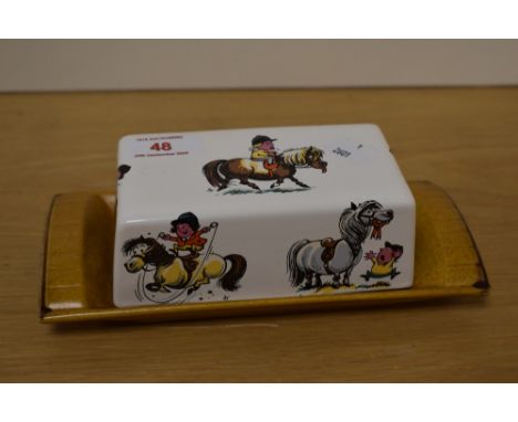 A Pallssy Norman Thelwell design butter dish and cover, of oblong form, printed  'The Royal Worcester Group' mark to base, 20