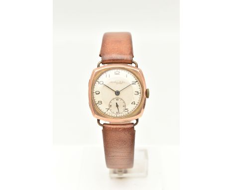 A VINTAGE 1940S 9CT ROSE GOLD THOMAS RUSSELL &amp; SON WRISTWATCH, the circular silver dial, with black Arabic numerals, blue