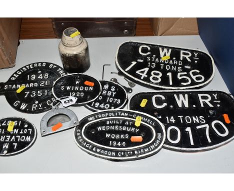 A COLLECTION OF MAINLY G.W.R. WAGON PLATES, assorted styles, one of the D type plates has had metal washers fitted over the f