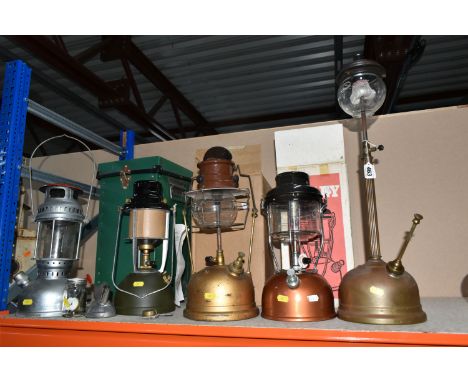 A GROUP OF VINTAGE LANTERNS, to include a brass vintage Tilly lamp, with Pyrex brand 182 shade, industrial 1970's Tilly lamp,