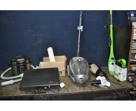 A COLEECTION OF HOUSEHOLD ELECTRICALS including an Electrolux vacuum cleaner, a Pressure King Pressure cooker, a steam mop, a