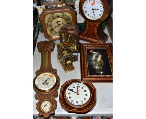 A GROUP OF CLOCKS, comprising a modern large mantel clock, height 50cm, a Kienzle wall clock with ceramic case, a WKB anniver