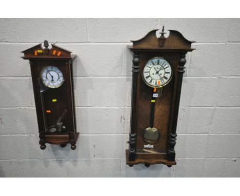 A 20TH CENTURY WALL CLOCK, the glass door enclosing an 8 inch brass and enamel dial, depicting Roman numerals, height approxi