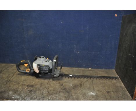 A TITAN TTL866HDC PETROL HEDGE TRIMMER (engine pulls freely but hasn't started)