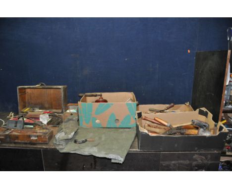 A PLYWOOD TOLLCHEST AND THREE TRAYS CONTAINING TOOLS including a marking stand, a brass paraffin lamp, a military kit bag, ha