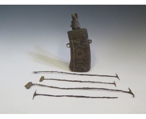 Four Sierra Leone Kissi Pennies and early carved wood and metal mounted powder flask