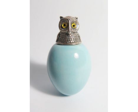 A Sterling Silver Mounted Porcelain Scent Bottle with screw top in the form of an owl with glass eyes, c. 6 cm