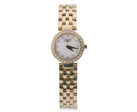 Ladies first quarter of 21st century Longines hallmarked 18ct gold dress watch with gold hands to a mother of pearl dial with