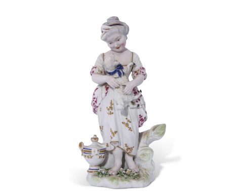18th century Derby patch mark figure of a young girl holding a lamb on green base decorated with flowers, 22cm high