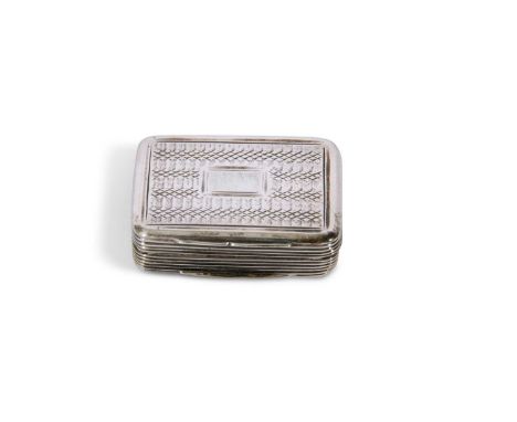 George IV silver vinaigrette of rectangular form with rounded corner, having engine turned lid and base, reeded sides, the hi