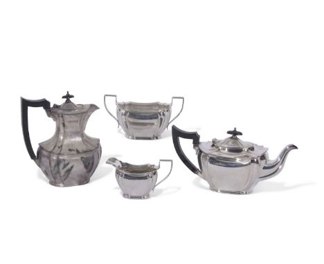George V four piece tea service of shaped oval form with fluted corners, angular handles comprising tea pot (16cm tall), hot 