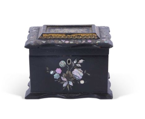 Victorian black lacquered and mother of pearl inlaid tea caddy, the hinged top opening to a two section interior, the body ra