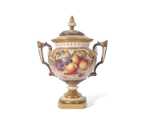 Large Royal Worcester vase with reticulated cover and gilt handles, the vase finely painted with fruit on a mossy ground, sig