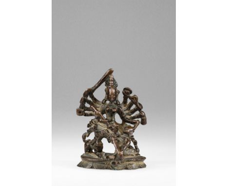 BronzeSouth-India , 17th centuryDimensions: Height 8 cmWeight: 183,8 gramsFine statue of the Goddess of War. The base is a lo