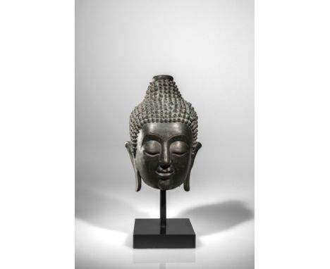 BronzeThailand , Late Ayutthaya Period , 18th centuryDimensions: Height 23 cm without baseWeight: 6512 gramsRound head of a B