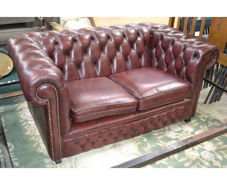 A two seater leather Chesterfield sofa by Gasgoigne Furniture