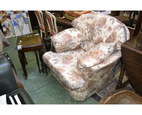 An oak standard lamp; a mahogany nest of tables; a floral armchair
