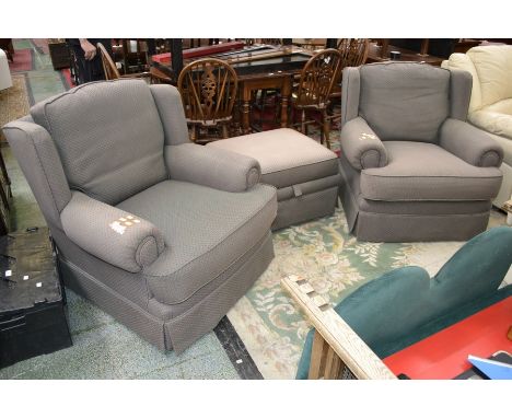 A pair of armchairs and pouffe, upholstered in green with red and orange lozenges