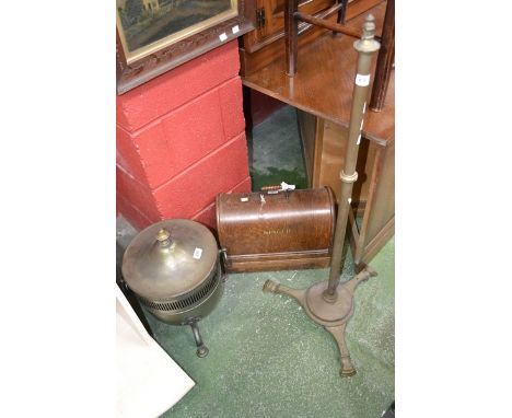 A brass telescopic standard lamp; a brass coal scuttle; a Singer sewing machine
