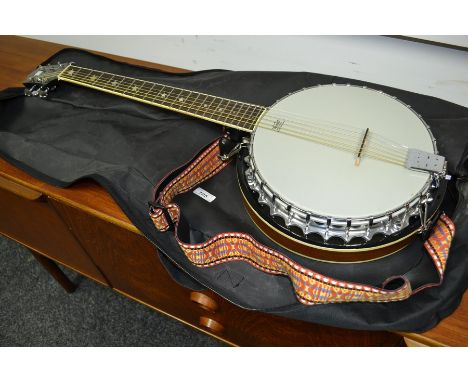 A Stagg six string banjo, cased