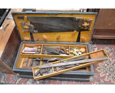A carpenter's tool chest with tools