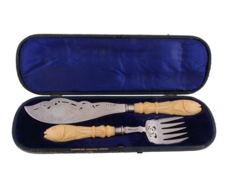  A cased pair of Victorian silver fish servers by Harrison Brothers & Howson, Sheffield 1846, pierced and engraved with folia