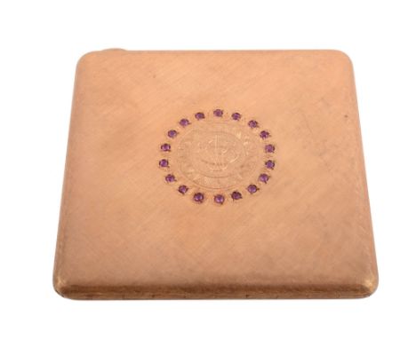  An Italian gold coloured ruby mounted square powder compact, 1944-68 Milan control mark, K18 and 750, textured overall, the 
