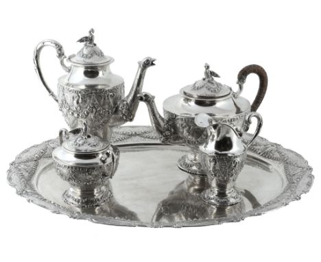  A German silver coloured four piece tea and coffee service on a tray, maker's mark not traced, post 1886 .800 standard, the 