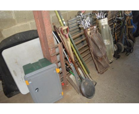 A quantity of long handled gardening tools; a bed warming pan etc