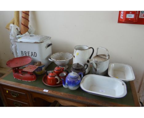 A quantity of enamel items and a set of scales