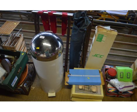 A bin together with a luggage rack; wall mounted tea light holders; folding chair etc.