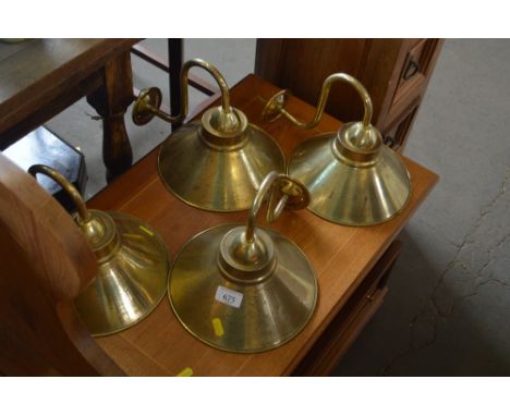 Four brass light shades