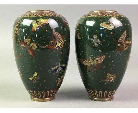 PAIR OF JAPANESE CLOISONNE ENAMEL VASES MEIJI PERIOD of shouldered baluster form, decorated with butterflies on a green groun