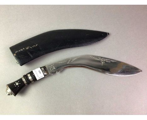 NEPALESE KUKRI with original leather clad scabbardThe blade is 29cm long