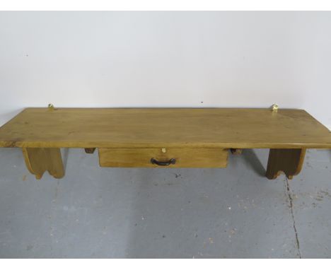 An early 20th century rustic pine shelf with a drawer -  stripped and waxed - 119cm W 