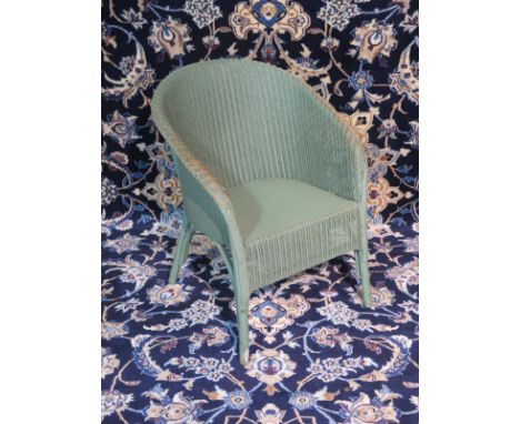 A green Lloyd Loom chair, some wear but sturdy 