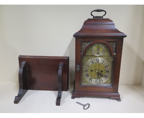 A mahogany twin fusee bracket clock with an arched dial with strike silent and calendar, striking on a bell, 50cm tall, with 