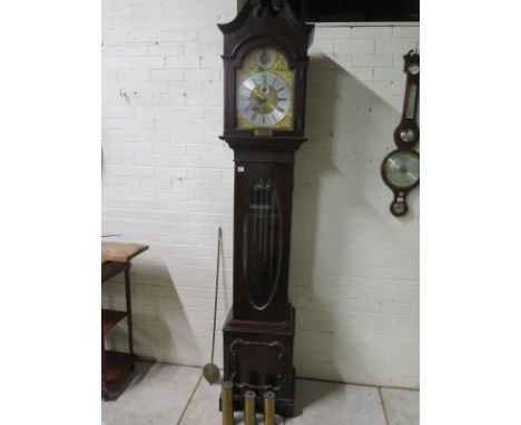 An early 1900s mahogany chiming 8 day long case clock, chiming on five pipes, with presentation plaque, dated 1927 - 231cm ta