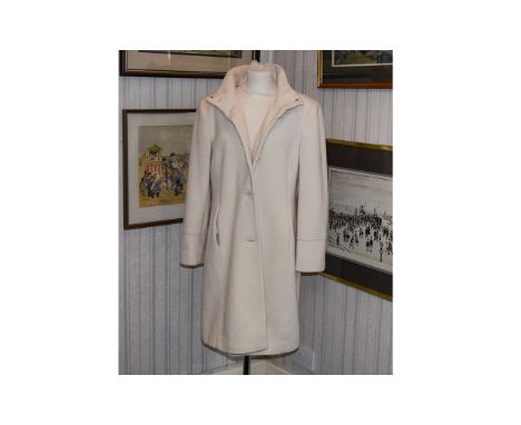 Cream Wool Blend Ladies Mid Length Coat By BHS features stand collar, concealed side seam pockets, front button fastening, cr