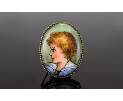 Victorian Period Silver Gilt Oval Shaped Painted Portrait Brooch of a Young Person. Dated to Obverse Nov 1880. Height 1.75 In