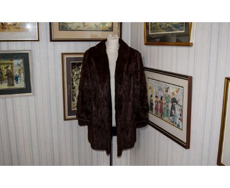 Vintage Coney Fur Coat Ladies brown rabbit fur coat with small stand collar and fitted cuff detail. Concealed side seam pocke