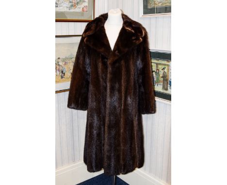 A Mink And Suede Full length Ladies Vintage Coat dark pastel mink coat with dark brown suede inserts. Features two way collar