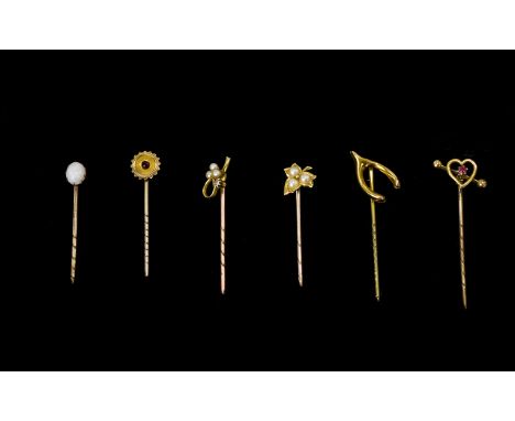 Antique Period Nice Collection Of Stone 18ct And 15ct Gold Stick Pins Set with opal, ruby, seed pearl and garnet. 4 marked 18