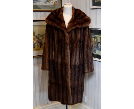 Vintage Squirrel Coat Ladies fur coat with wide shawl collar, hook and eye closure and side seam pockets. Lined in dark brown