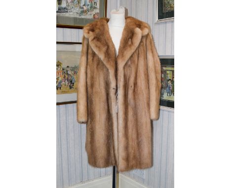 Golden Blonde Mink Coat Three quarter vintage coat in plush blonde mink with side seam pockets and revere collar. hook and ey