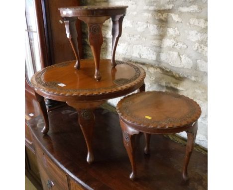 An Indonesian carved hardwood trunk, together with an occasional table and a pair of smaller tables