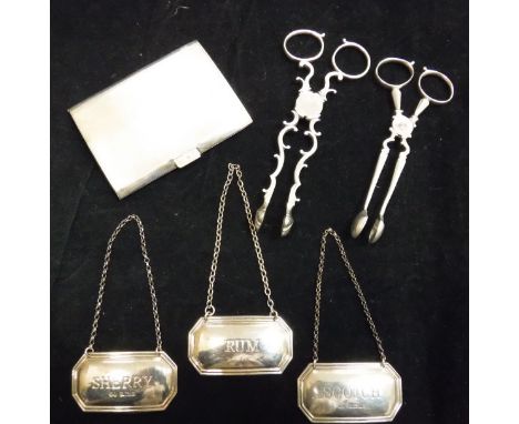 A silver cigarette case, two silver sugar tongs, three silver bottle labels inscribed "Sherry", "Rum" and "Scotch", approx 4.