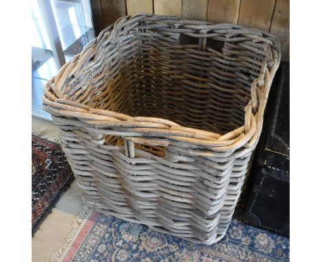 A large wicker log basket, together with a wicker hamper