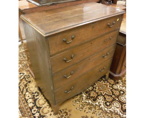 A 19th Century oak chest of four long drawers on bracket feet