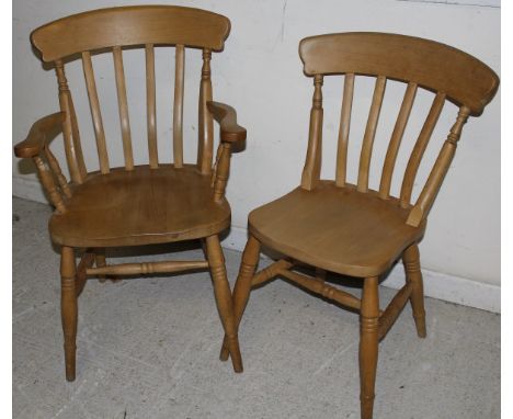 A set of eight beech stick back dining chairs (6 plus 2)